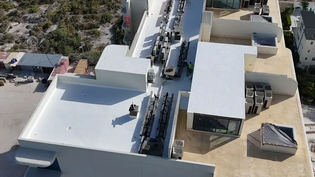 Aerial view of the finished white roof coating around rooftop equipment, St. Regis, Turks and Caicos